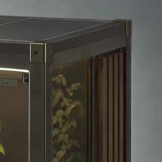 The upper front-right corner in the Cellar finish: black bronze corner block with a small lens window, an opaque roof cassette and dark oak fins.